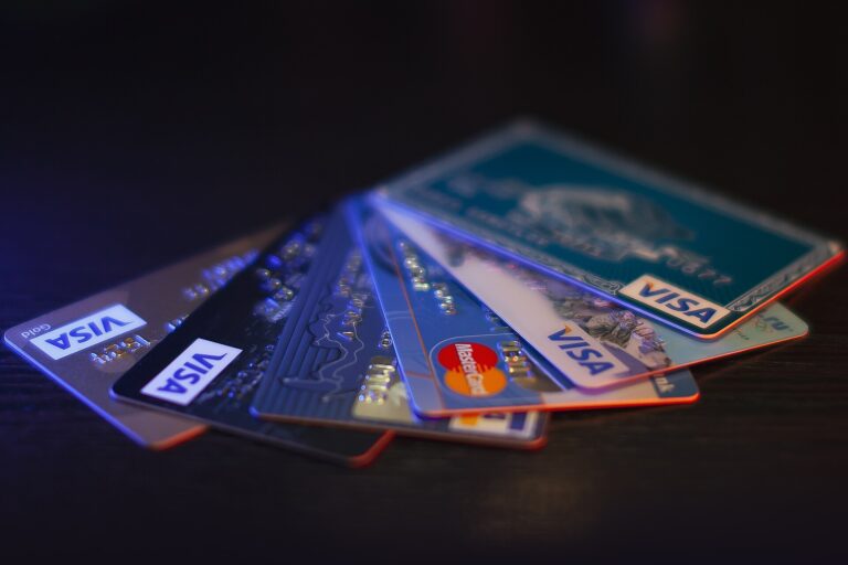 Credit freeze illustration: several credit cards arranged on a dark surface