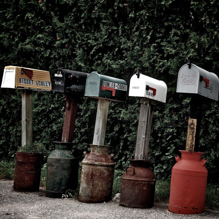 Debt validation notice illustration: a row of roadside mailboxes in Canada, not Boston